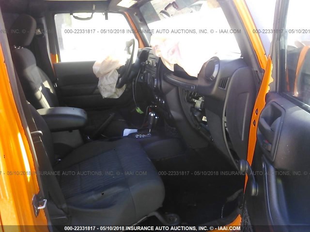 1C4BJWDG5CL179087 - 2012 JEEP WRANGLER UNLIMITE SPORT ORANGE photo 5