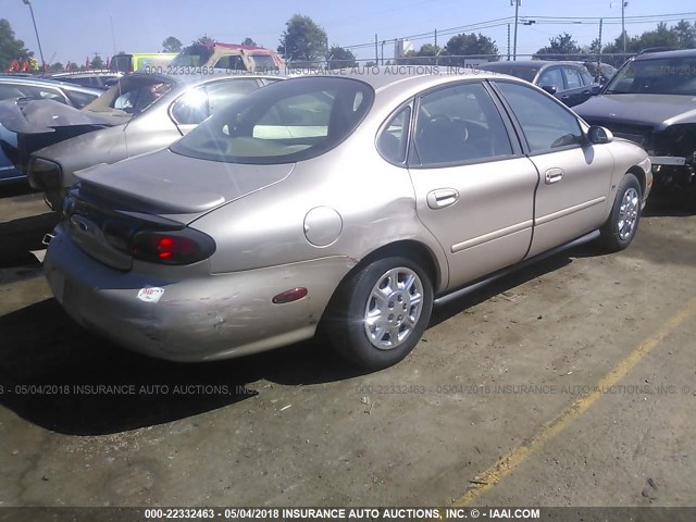 1FAFP52S6WA182331 - 1998 FORD TAURUS LX/SE GOLD photo 4