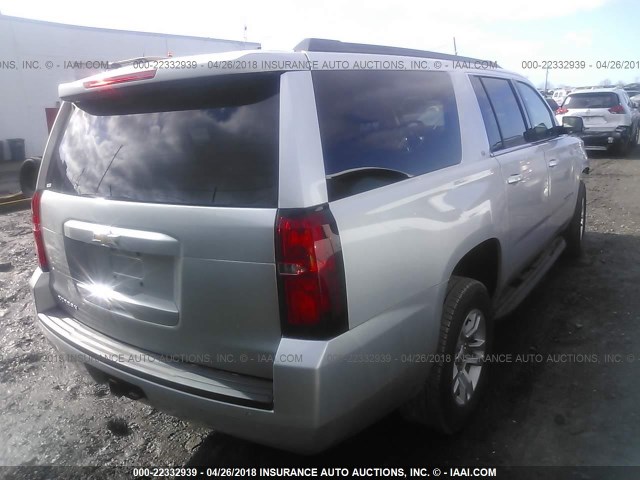 1GNSKHKCXJR147620 - 2018 CHEVROLET SUBURBAN K1500 LT SILVER photo 4