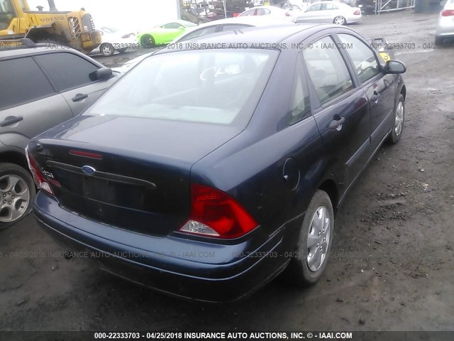 1FAFP33P93W101321 - 2003 FORD FOCUS LX BLUE photo 4