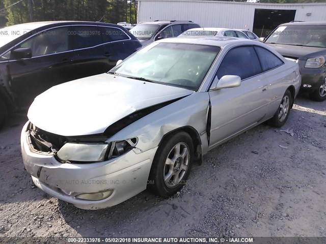 2T1CF28PX2C567320 - 2002 TOYOTA CAMRY SOLARA SE/SLE ვერცხლისფერი ფოტო 2