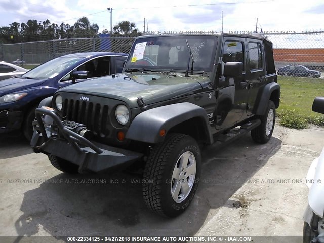 1J4GA39178L538689 - 2008 JEEP WRANGLER UNLIMITE X GREEN photo 2