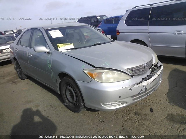 JTDBE32K340277757 - 2004 TOYOTA CAMRY LE/XLE SILVER photo 1