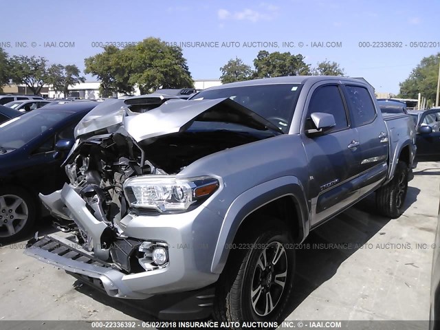 3TMAZ5CN1GM019100 - 2016 TOYOTA TACOMA DBL CAB/SR5/TRD SPORT/OR SILVER photo 2