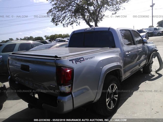 3TMAZ5CN1GM019100 - 2016 TOYOTA TACOMA DBL CAB/SR5/TRD SPORT/OR SILVER photo 4