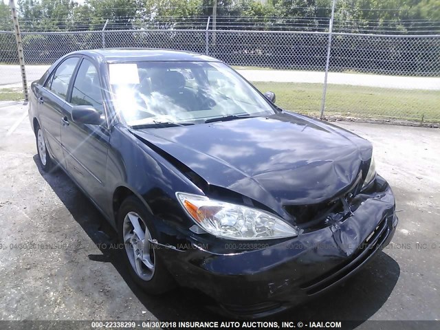 4T1BE32KX2U081039 - 2002 TOYOTA CAMRY LE/XLE/SE BLACK photo 1