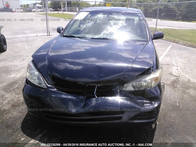 4T1BE32KX2U081039 - 2002 TOYOTA CAMRY LE/XLE/SE BLACK photo 6