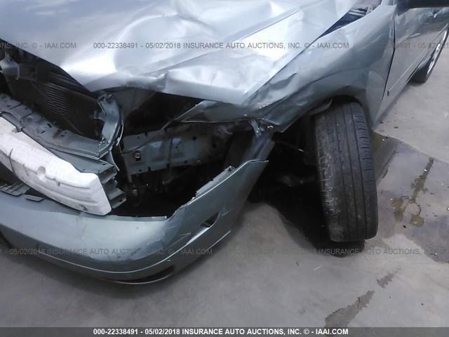 3FAFP37N65R115224 - 2005 FORD FOCUS ZX5 GRAY photo 6