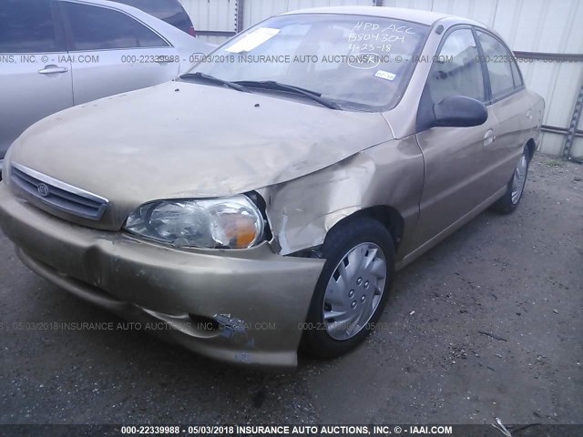 KNADC123326181856 - 2002 KIA RIO GOLD photo 6