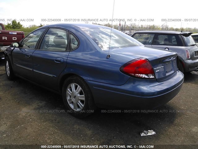 1FAFP56S64A118877 - 2004 FORD TAURUS SEL BLUE photo 3