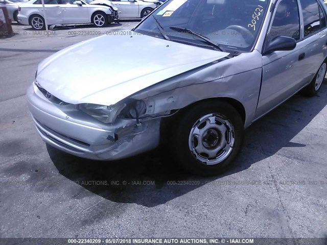 1NXBR12E3YZ305621 - 2000 TOYOTA COROLLA VE/CE/LE SILVER photo 6