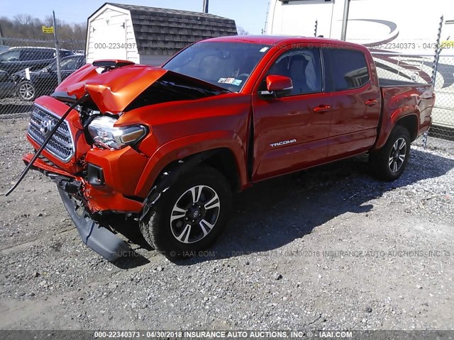 3TMCZ5AN8HM098830 - 2017 TOYOTA TACOMA DBL CAB/SR/TRDSPT/OR/PRO ORANGE photo 2