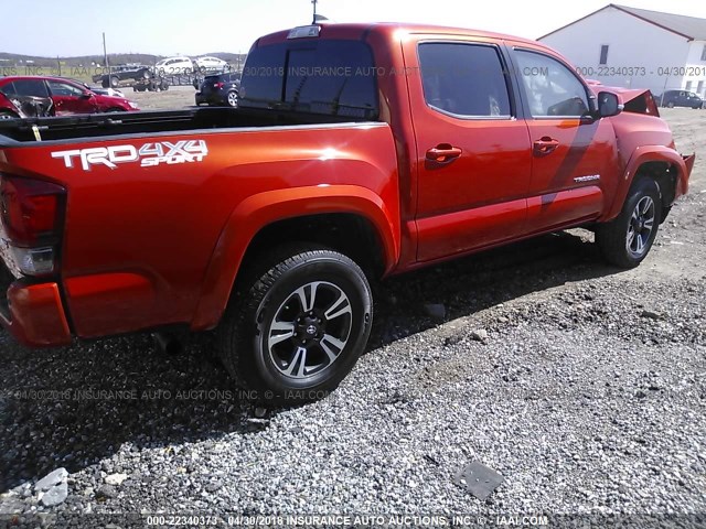 3TMCZ5AN8HM098830 - 2017 TOYOTA TACOMA DBL CAB/SR/TRDSPT/OR/PRO ORANGE photo 4