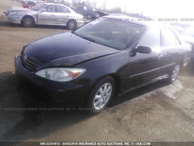 4T1BE30K32U072170 - 2002 TOYOTA CAMRY LE/XLE/SE BLACK photo 2