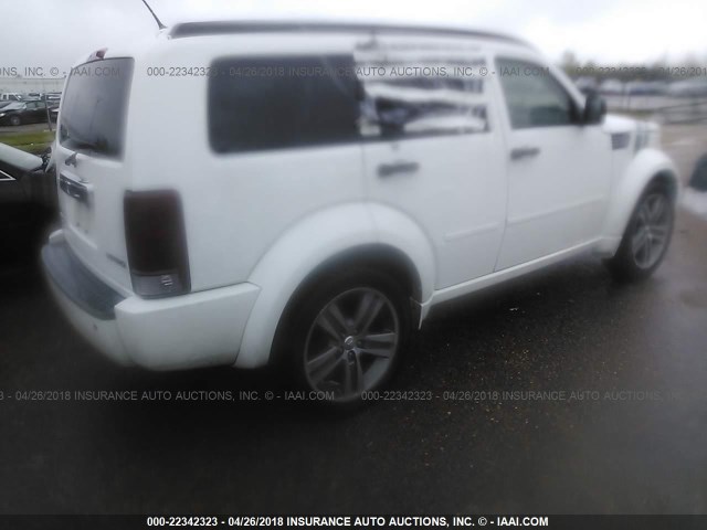 1D4PT6GX4BW589309 - 2011 DODGE NITRO DETONATOR WHITE photo 4