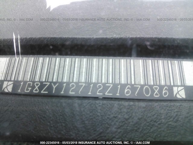 1G8ZY12712Z167086 - 2002 SATURN SC2 BLACK photo 9