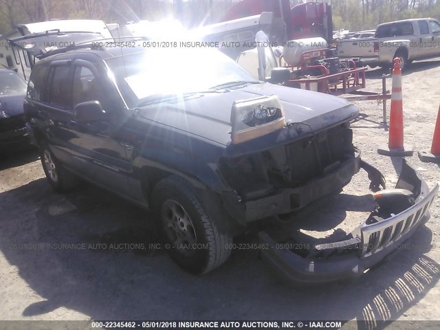 1J4GW58S9XC702904 - 1999 JEEP GRAND CHEROKEE LAREDO BLACK photo 1