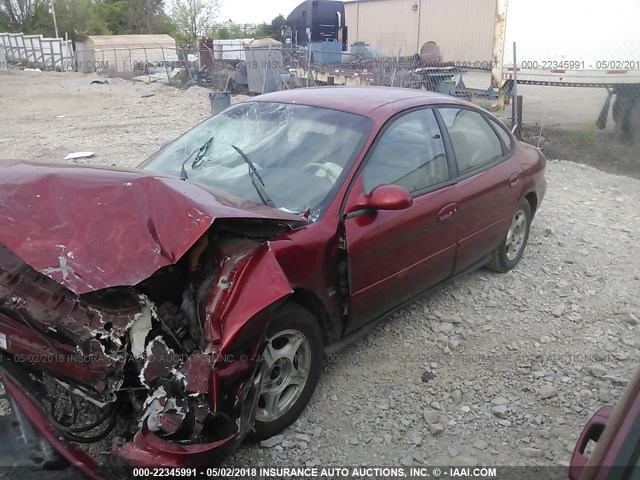 1FAFP53S7XA280851 - 1999 FORD TAURUS SE/COMFORT/SPORT RED photo 2