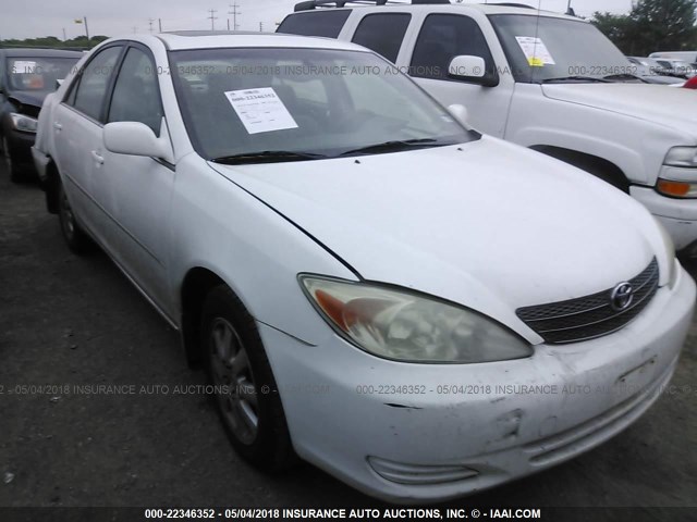 JTDBF32K320031527 - 2002 TOYOTA CAMRY LE/XLE/SE WHITE photo 1