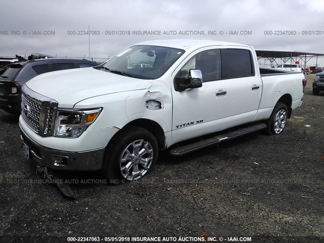 1N6AA1F27GN511831 - 2016 NISSAN TITAN XD SL/PLATINUM RESERVE/SV WHITE photo 2