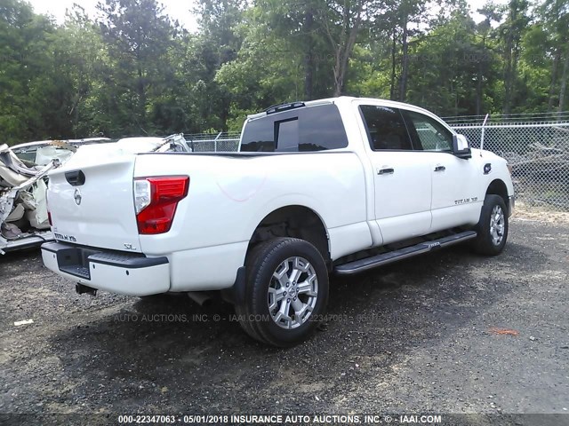 1N6AA1F27GN511831 - 2016 NISSAN TITAN XD SL/PLATINUM RESERVE/SV WHITE photo 4