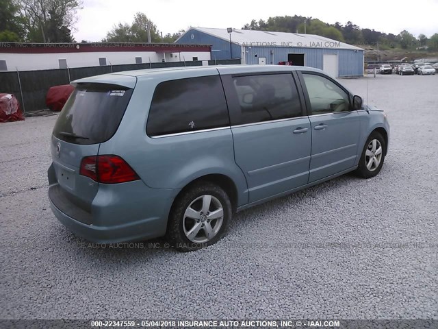 2V8HW34169R543060 - 2009 VOLKSWAGEN ROUTAN SE Light Blue photo 4