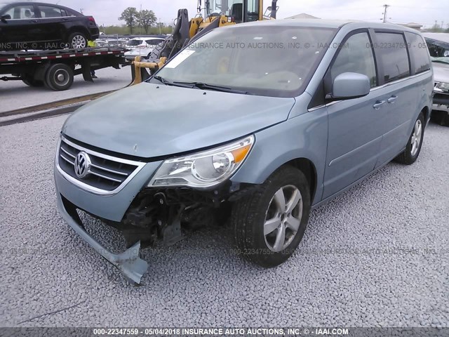 2V8HW34169R543060 - 2009 VOLKSWAGEN ROUTAN SE Light Blue photo 6