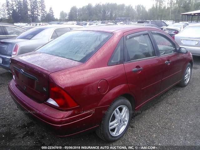 1FAHP3438YW403825 - 2000 FORD FOCUS SE/SE SPORT RED photo 6