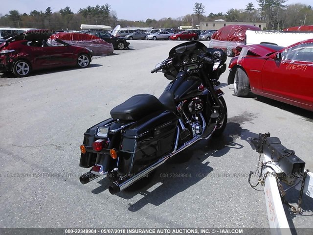 1HD1FC4158Y707369 - 2008 HARLEY-DAVIDSON FLHTCUI BLACK photo 4