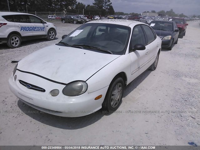 1FAFP52U9XA331396 - 1999 FORD TAURUS LX WHITE photo 2