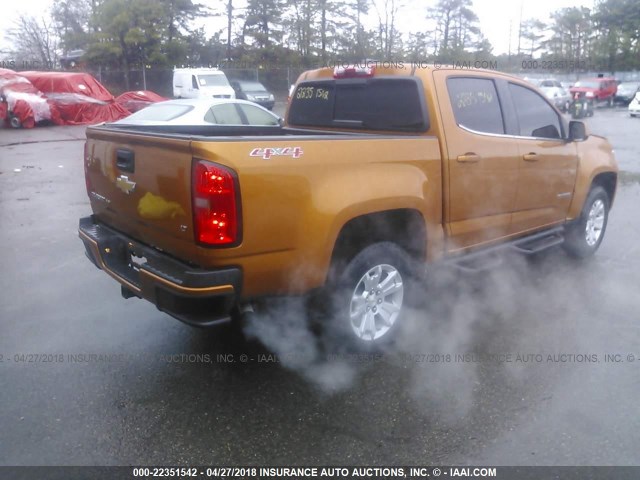 1GCGTCEN6H1290696 - 2017 CHEVROLET COLORADO LT ORANGE photo 4