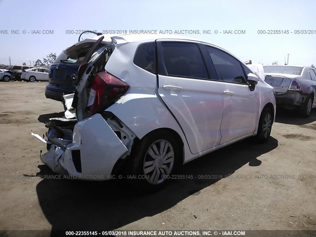 JHMGK5H55GX018953 - 2016 HONDA FIT LX WHITE photo 4