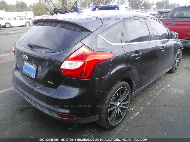 1FAHP3M20CL375486 - 2012 FORD FOCUS SEL BLACK photo 4