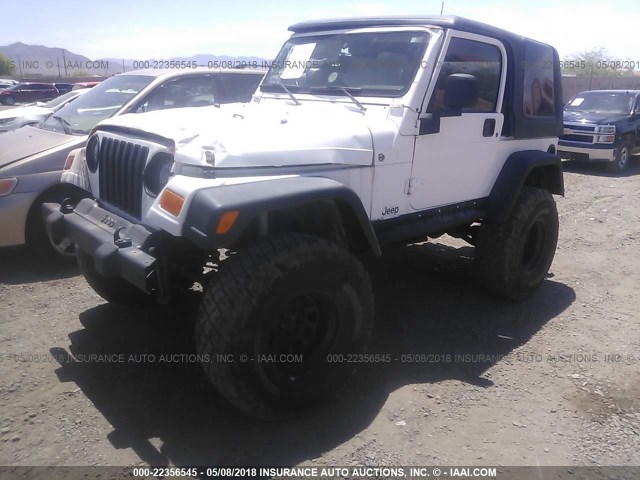 1J4FA59SXYP747899 - 2000 JEEP WRANGLER / TJ SAHARA BLACK photo 2