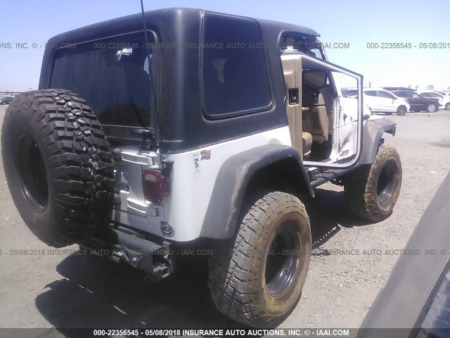 1J4FA59SXYP747899 - 2000 JEEP WRANGLER / TJ SAHARA BLACK photo 4