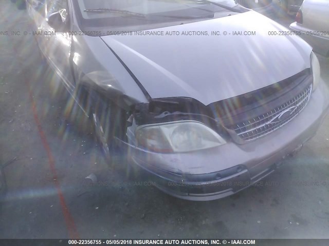 2FMZA524X2BA51018 - 2002 FORD WINDSTAR SE SILVER photo 6