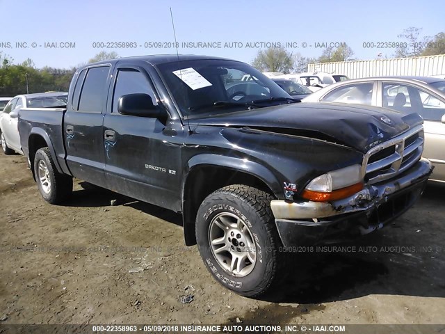 1B7GG2AN11S104499 - 2001 DODGE DAKOTA QUAD BLACK photo 1