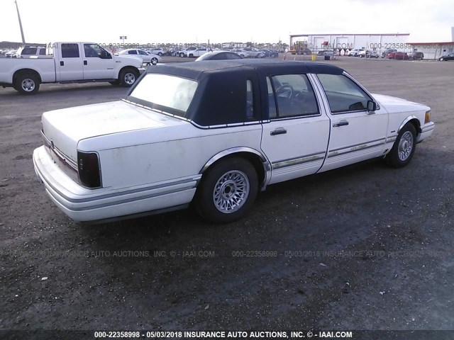 1LNLM81W3RY720101 - 1994 LINCOLN TOWN CAR EXECUTIVE WHITE photo 4