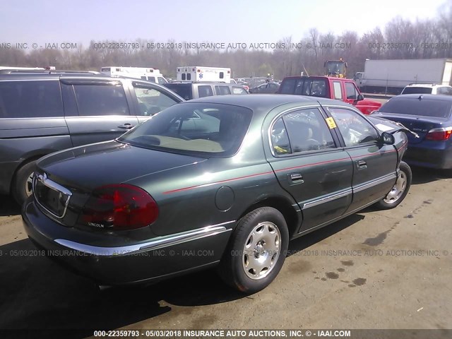 1LNFM97V2WY739977 - 1998 LINCOLN CONTINENTAL  绿色 照片 4