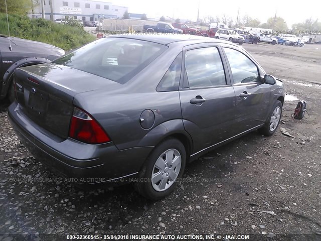 1FAHP34NX7W259615 - 2007 FORD FOCUS ZX4/S/SE/SES GRAY photo 4