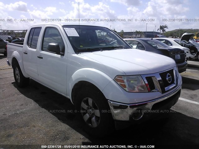 1N6AD07UX9C423372 - 2009 NISSAN FRONTIER CREW CAB SE/LE/NISMO WHITE photo 1