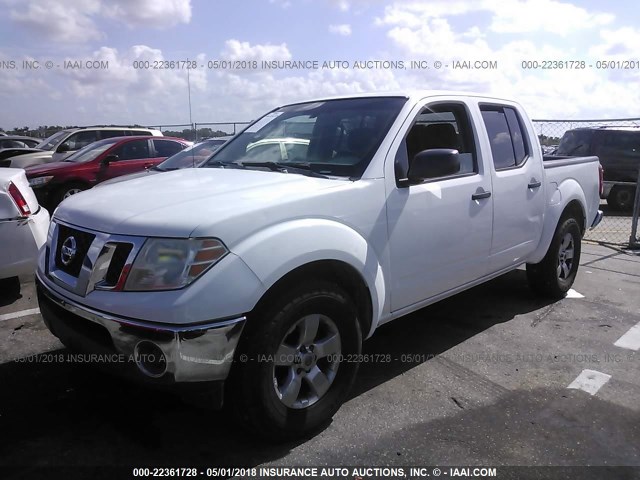 1N6AD07UX9C423372 - 2009 NISSAN FRONTIER CREW CAB SE/LE/NISMO WHITE photo 2