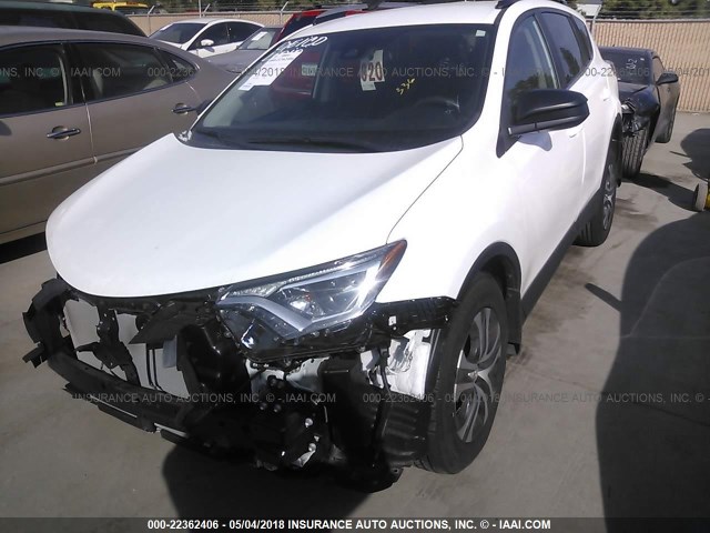 2T3BFREV1HW554509 - 2017 TOYOTA RAV4 LE WHITE photo 2