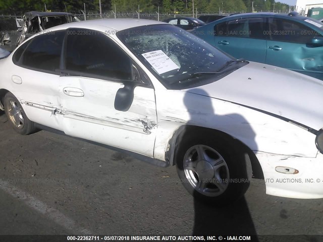 1FAFP52U6XA314975 - 1999 FORD TAURUS LX WHITE photo 6