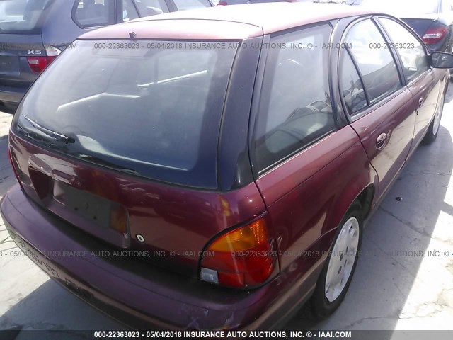 1G8ZJ8275VZ283800 - 1997 SATURN SW2 RED photo 4