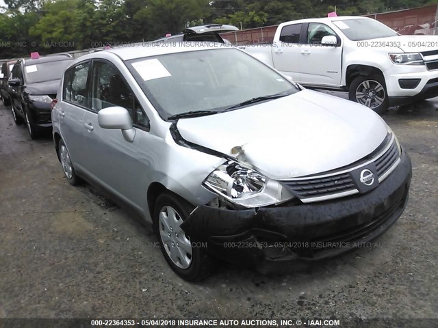 3N1BC13E19L480131 - 2009 NISSAN VERSA S/SL SILVER photo 1