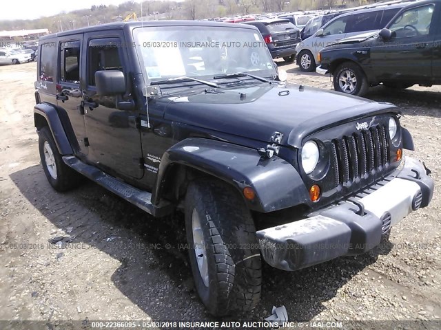 1J8GA59149L700256 - 2009 JEEP WRANGLER UNLIMITE SAHARA BLACK photo 1