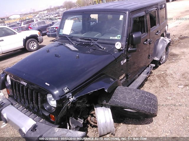 1J8GA59149L700256 - 2009 JEEP WRANGLER UNLIMITE SAHARA BLACK photo 2