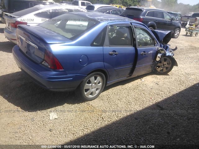 1FAFP38322W186216 - 2002 FORD FOCUS ZTS BLUE photo 4