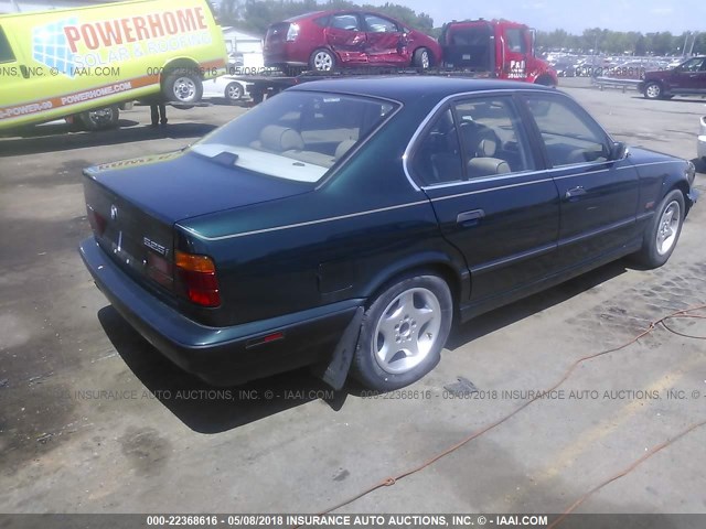 WBAHD6323SGK86957 - 1995 BMW 525 I AUTOMATIC Navy photo 4